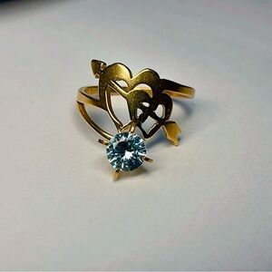 NWT Women's Gold Stainless Steel Stone Zircon ring. Cupid. Size 7.5